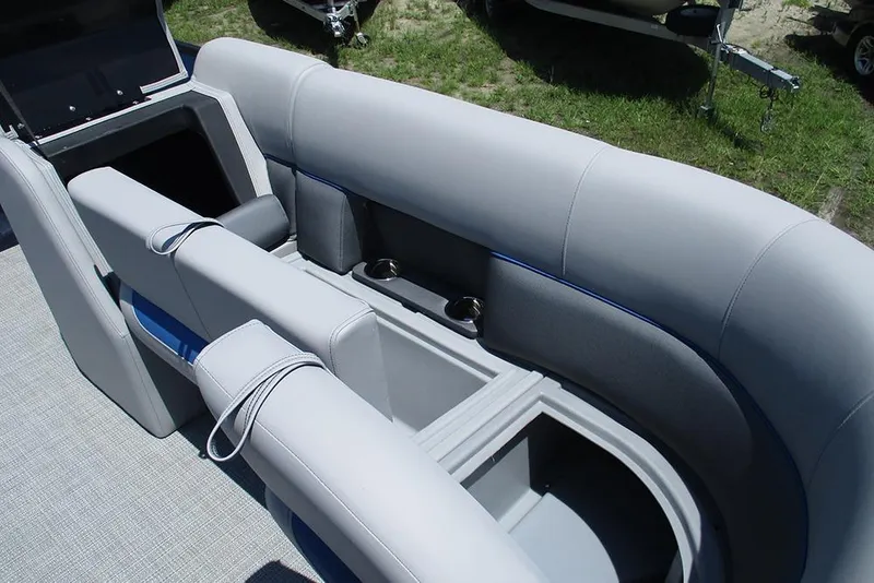 Slide: The Image of 2026 Bentley Pontoons Legacy 220 Quad Swingback interior with plush seating and cup holders. - 11
