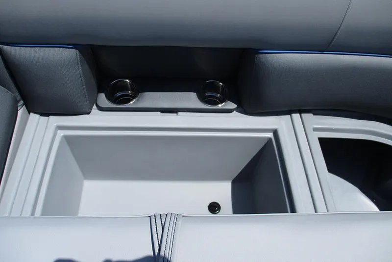 Slide: The Image of Interior of 2026 Bentley Pontoons Legacy 220 Quad Swingback with storage compartment and cup holders. - 13