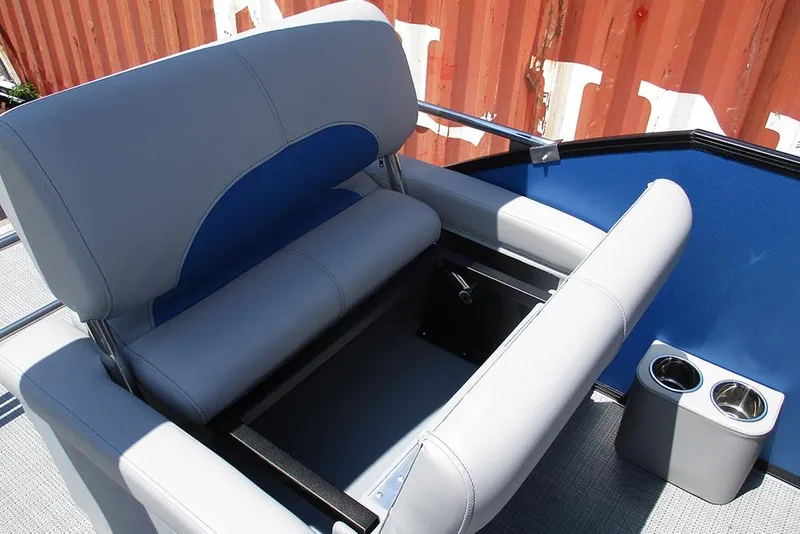 Slide: The Image of 2026 Bentley Pontoons Legacy 220 Quad Swingback seating with storage and cup holders. - 22