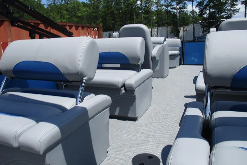 Slide: The Image of 2026 Bentley Pontoons Legacy 220 Quad Swingback interior with plush seating and modern design. - 25