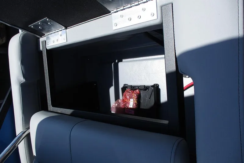 Slide: The Image of Storage compartment in 2026 Bentley Pontoons Legacy 220 Quad Swingback boat interior. - 27