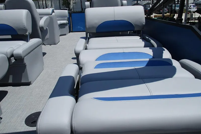 Slide: The Image of 2026 Bentley Pontoons Legacy 220 Quad Swingback interior with luxurious seating and modern design. - 29
