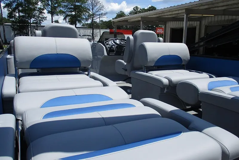 Slide: The Image of 2026 Bentley Pontoons Legacy 220 Quad Swingback with luxurious seating and modern design. - 30