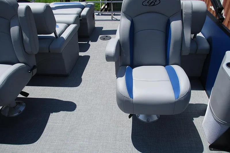 Slide: The Image of 2026 Bentley Pontoons Legacy 220 Quad Swingback interior with plush seating and modern design. - 33