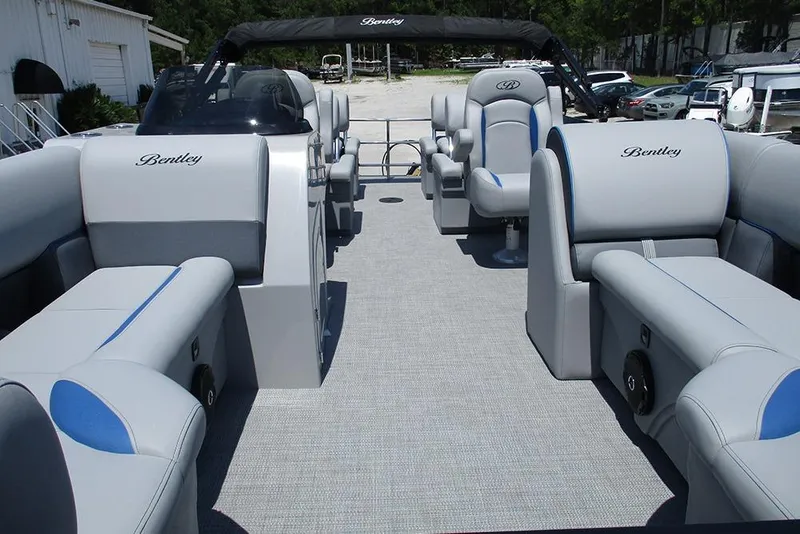 Slide: The Image of 2026 Bentley Pontoons Legacy 220 Quad Swingback with luxurious seating and sleek design. - 9