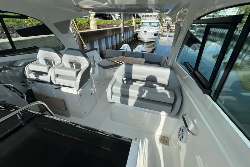 Slide: The Image of 2022 Beneteau Gran Turismo 32 interior with modern seating and sleek design. - 13
