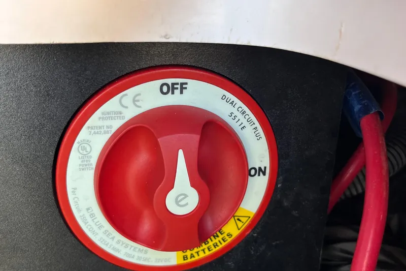 Slide: The Image of Red power switch on 2021 Regal 2300 Bowrider boat, labeled "Dual Circuit Plus." - 18