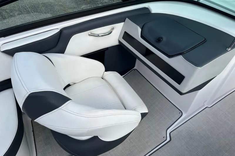 Slide: The Image of 2021 Regal 2300 Bowrider interior with white and black seating, modern design. - 5