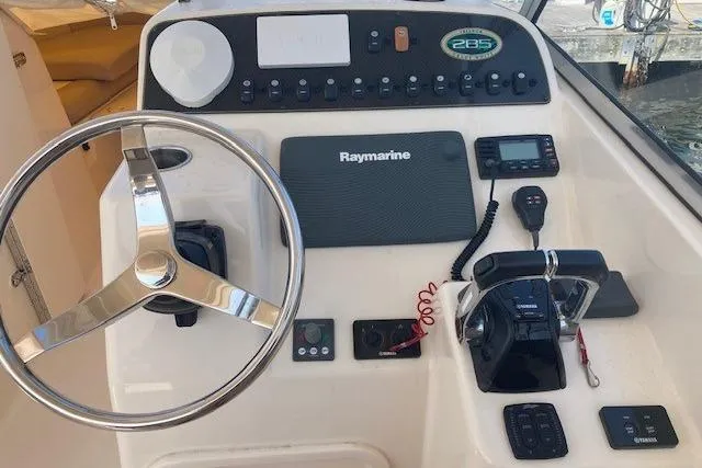 Slide: The Image of Control panel of 2014 Grady-White Freedom 285 boat with Raymarine electronics. - 9