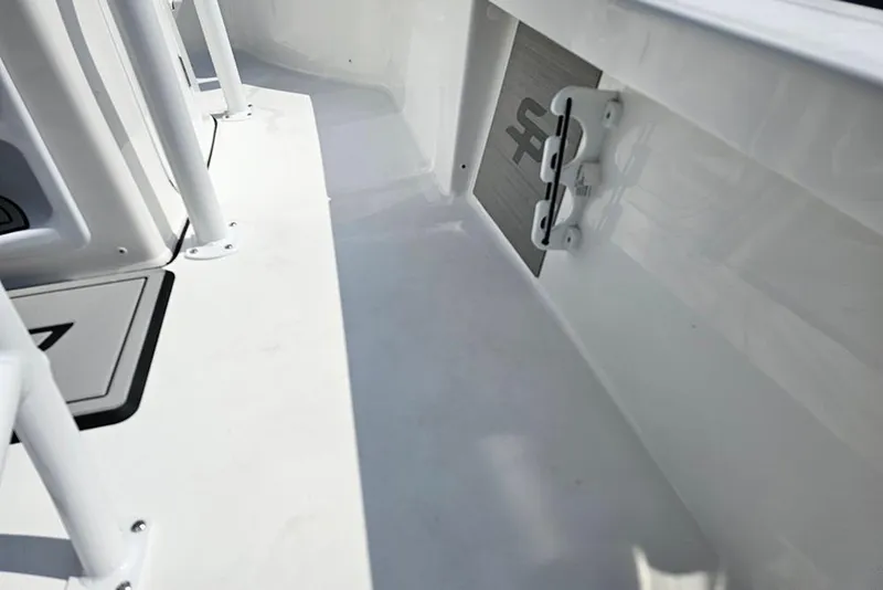 Slide: The Image of 2026 Sea Pro 230 Bay boat interior, showcasing sleek white deck and fittings. - 20