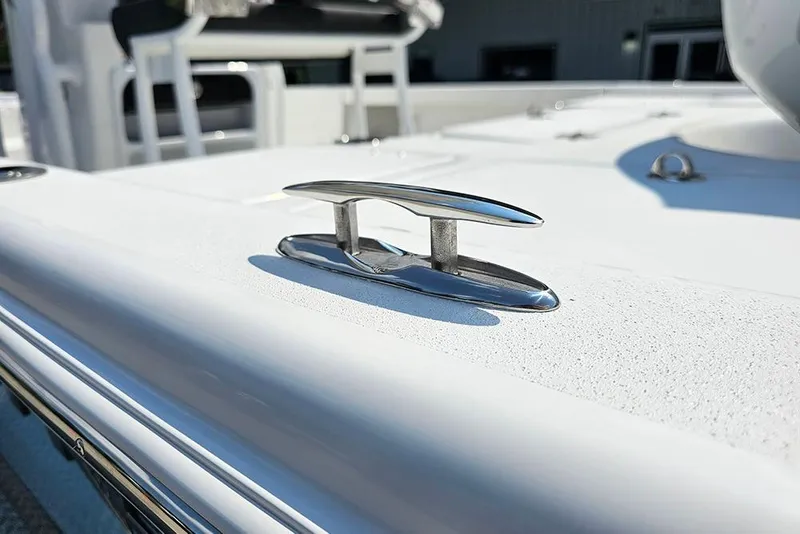 Slide: The Image of 2026 Sea Pro 230 Bay boat cleat on deck, showcasing sleek design and craftsmanship. - 32
