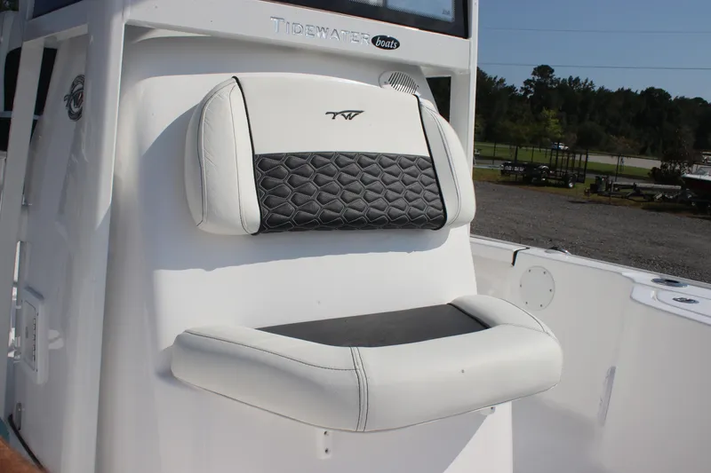 Slide: The Image of 2026 Tidewater 2110 Bay Max boat seat with stylish black and white design. - 16
