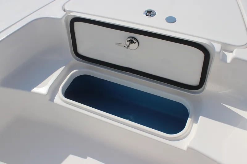 Slide: The Image of 2026 Tidewater 2110 Bay Max boat storage compartment with lockable hatch. - 7