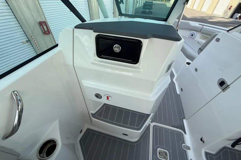 Slide: The Image of 2024 Pursuit DC 266 Dual Console interior with sleek design and modern features. - 17