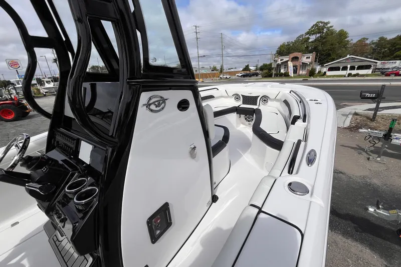 Slide: The Image of 2026 Tidewater 256 CC Adventure boat interior with sleek design and modern features. - 14