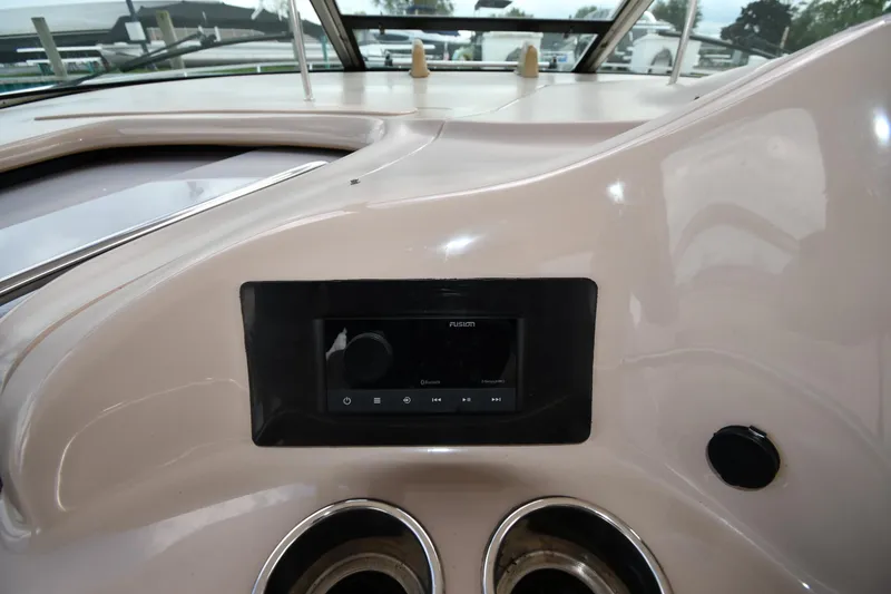 Slide: The Image of Control panel of 2003 Sea Ray 460 Sundancer yacht with modern audio system. - 13