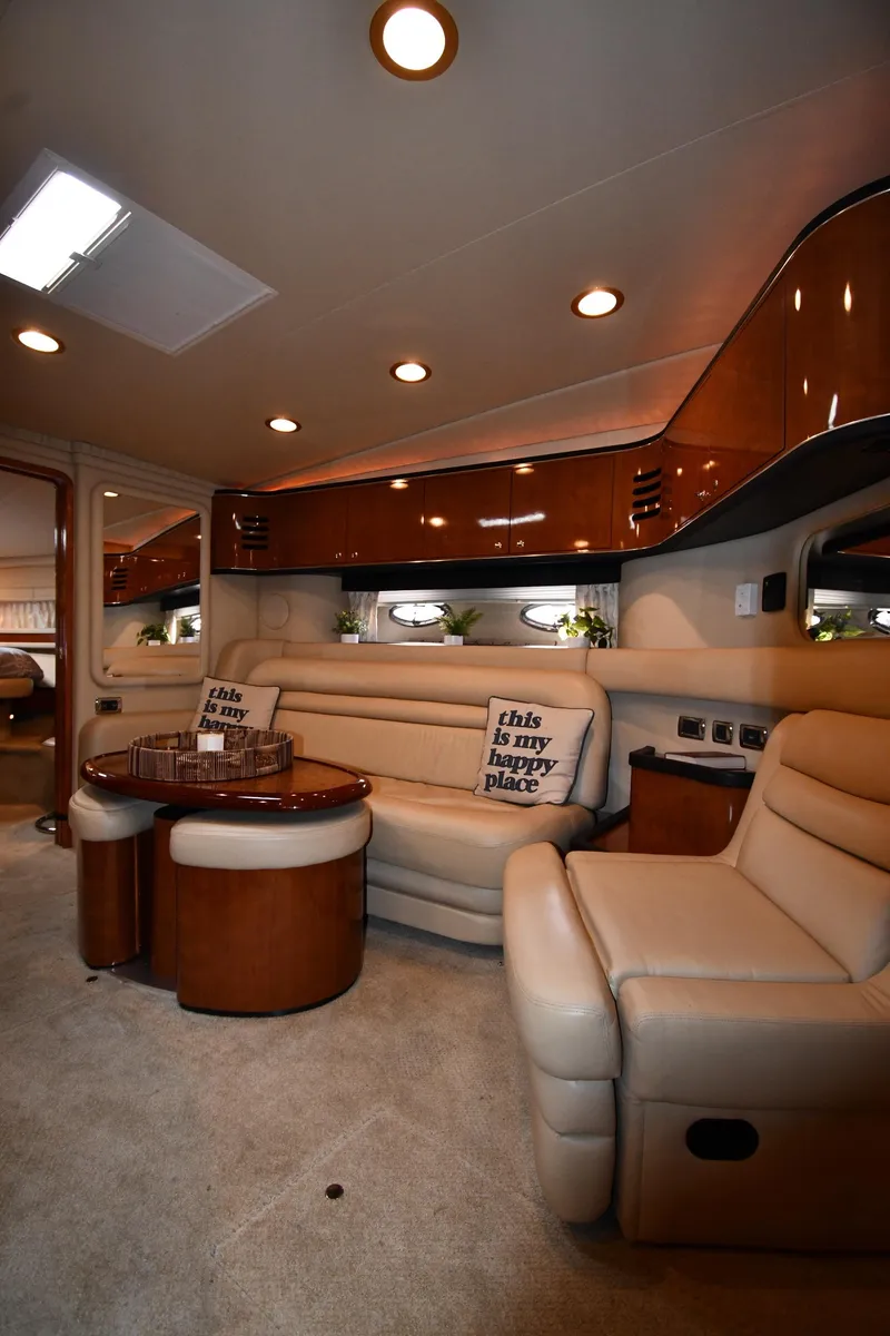 Slide: The Image of Luxurious interior of a 2003 Sea Ray 460 Sundancer yacht with plush seating and elegant design. - 45