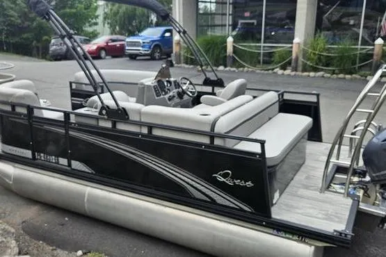 Slide: The Image of 2022 Apex Marine Qwest pontoon boat with sleek design and comfortable seating. - 2