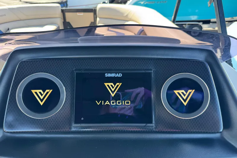 Slide: The Image of Dashboard of 2022 Viaggio Diamante B boat with Simrad display and logo. - 10