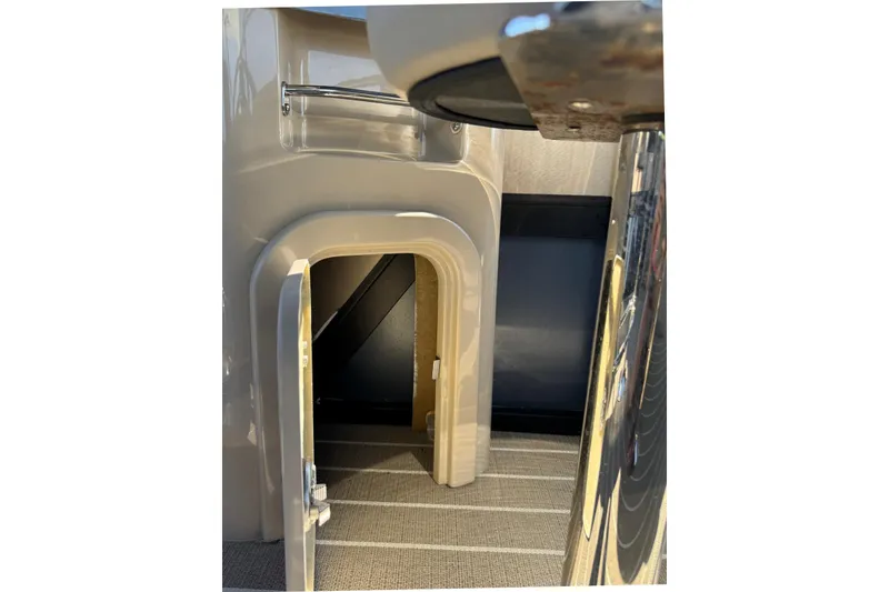 Slide: The Image of Interior view of 2022 Viaggio Diamante B boat, featuring a small access door. - 19