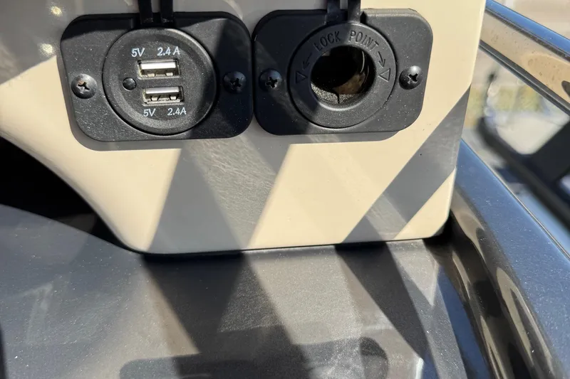 Slide: The Image of USB charging ports and lock point on 2022 Viaggio Diamante B boat dashboard. - 22