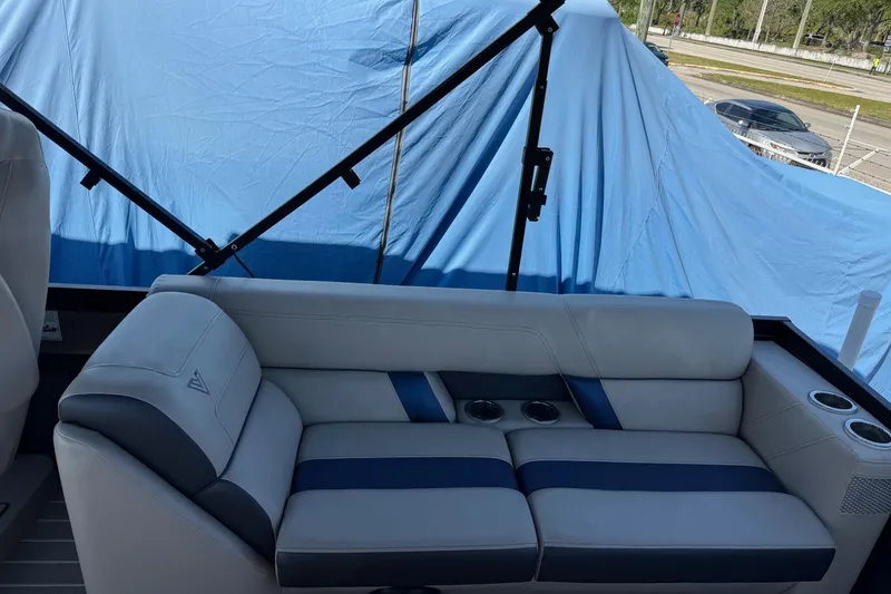 Slide: The Image of Luxurious seating on 2022 Viaggio Diamante B boat, featuring blue and gray upholstery. - 23