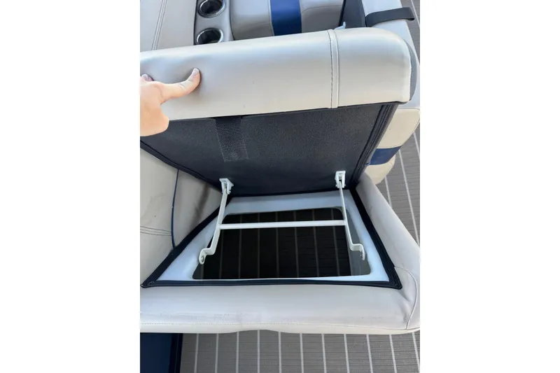 Slide: The Image of 2022 Viaggio Diamante B boat seat storage compartment with cup holders. - 24