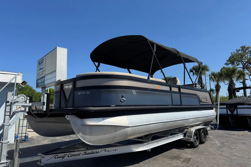 Slide: The Image of 2022 Viaggio Diamante B pontoon boat on trailer under clear blue sky. - 3