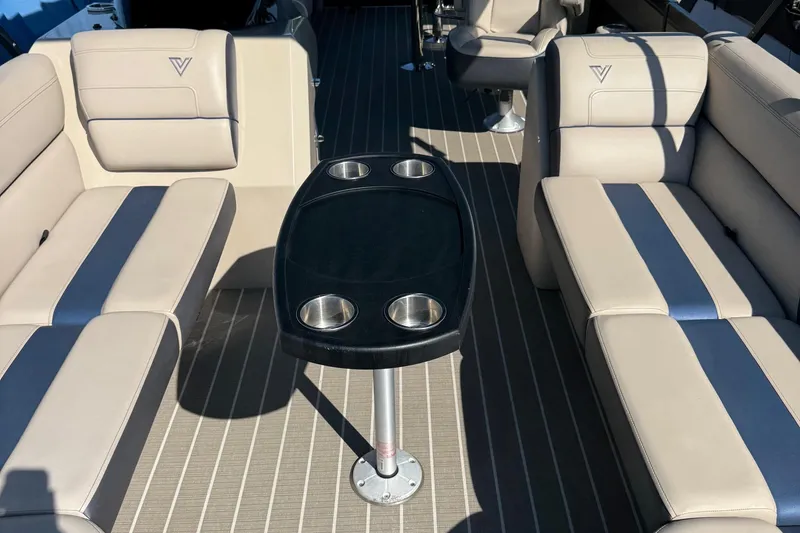 Slide: The Image of Luxurious interior of 2022 Viaggio Diamante B boat with beige seating and cupholders. - 31