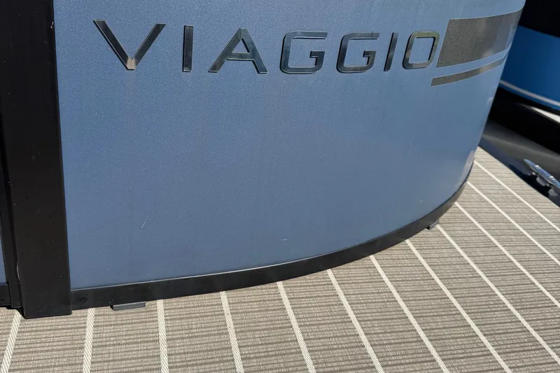 Slide: The Image of 2022 Viaggio Diamante B boat with logo on blue exterior. - 42
