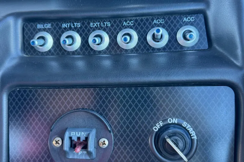 Slide: The Image of Control panel of a 2022 Viaggio Diamante B boat with switches and ignition. - 7