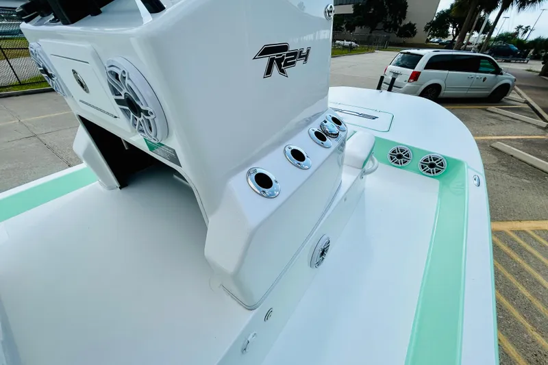 Slide: The Image of 2026 SCB R24 boat console with Garmin navigation, steering wheel, and controls. - 13