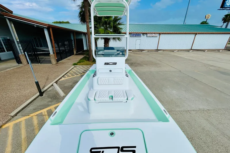 Slide: The Image of 2026 SCB R24 boat deck with mint green accents and speakers. - 16