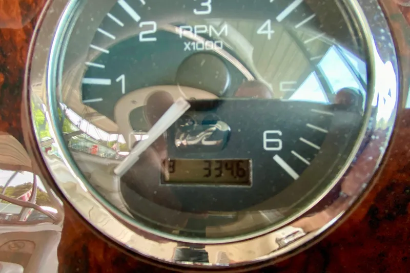 Slide: The Image of Close-up of a 2002 Sea Ray 290 SLX RPM gauge displaying 3346 hours. - 14