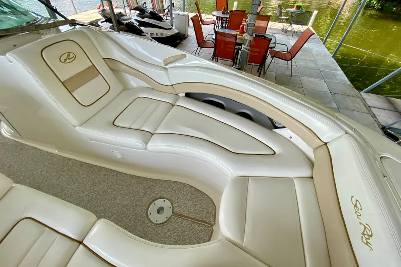 Slide: The Image of Luxurious 2002 Sea Ray 290 SLX boat interior with plush seating and elegant design. - 19