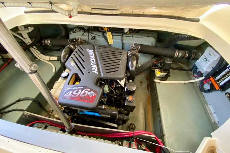 Slide: The Image of Engine compartment of a 2002 Sea Ray 290 SLX with a Mercury 496 MAG engine. - 29