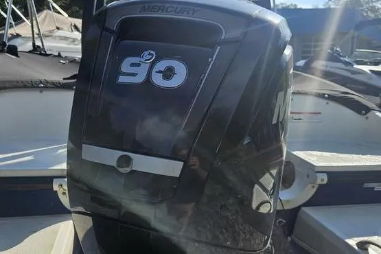 Slide: The Image of 2019 Bayliner Element E18 with Mercury 90 outboard engine in sunlight. - 3