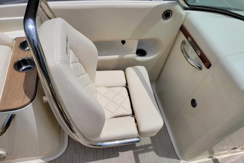 Slide: The Image of 2024 Chris-Craft Launch 27 interior with luxurious beige seating and elegant design. - 11