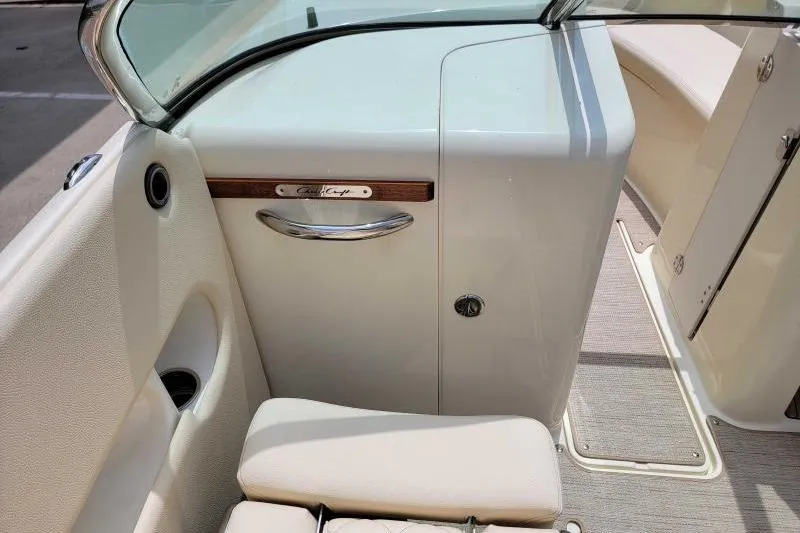 Slide: The Image of 2024 Chris-Craft Launch 27 interior, featuring elegant seating and sleek design elements. - 13