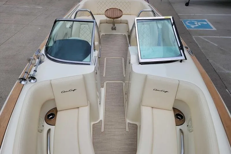 Slide: The Image of 2024 Chris-Craft Launch 27 boat interior with luxurious seating and elegant design. - 17
