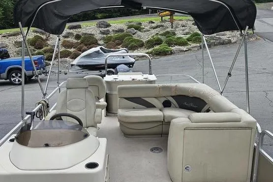 Slide: The Image of 2014 SunChaser Classic Fish 8522 4-PT pontoon boat with spacious seating and canopy. - 21