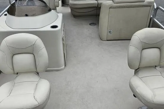 Slide: The Image of 2014 SunChaser Classic Fish 8522 4-PT boat interior with beige seating. - 22