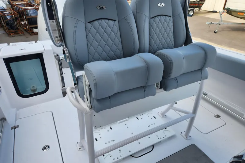 Slide: The Image of 2026 Sportsman Open 252 Center Console with luxurious dual seating and sleek design. - 11