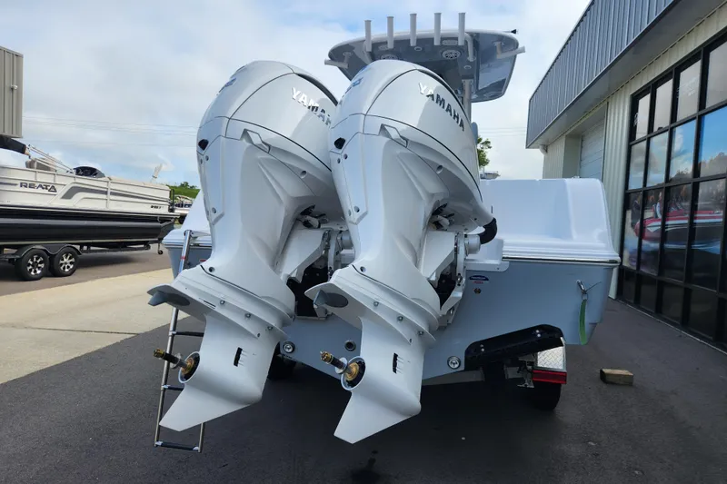 Slide: The Image of 2026 Sportsman Open 252 Center Console with dual Yamaha outboard engines. - 3