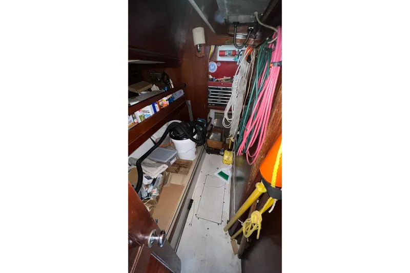 Slide: The Image of Interior of a 1977 Gulfstar 50 sailboat with ropes and equipment. - 25