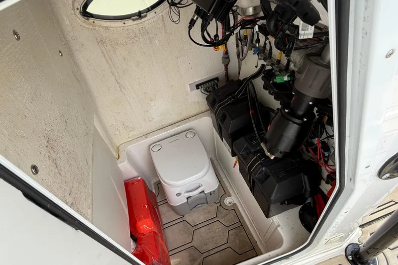 Slide: The Image of Compact boat interior with toilet, wiring, and equipment, LFG 22 model, 2023. - 8
