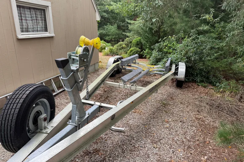 Slide: The Image of Trailer parked beside a house, surrounded by greenery, LFG model 22, 2023. - 9