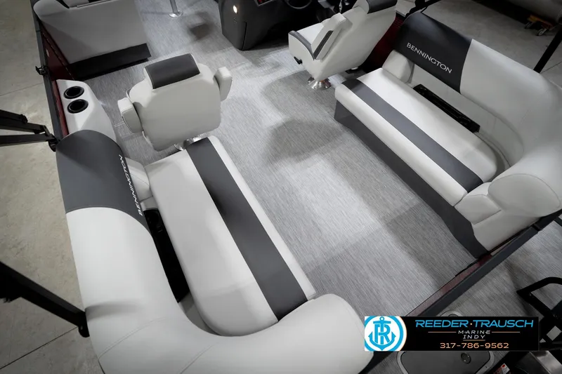 Slide: The Image of 2026 Bennington 20 SSR boat interior with modern seating and steering console. - 13