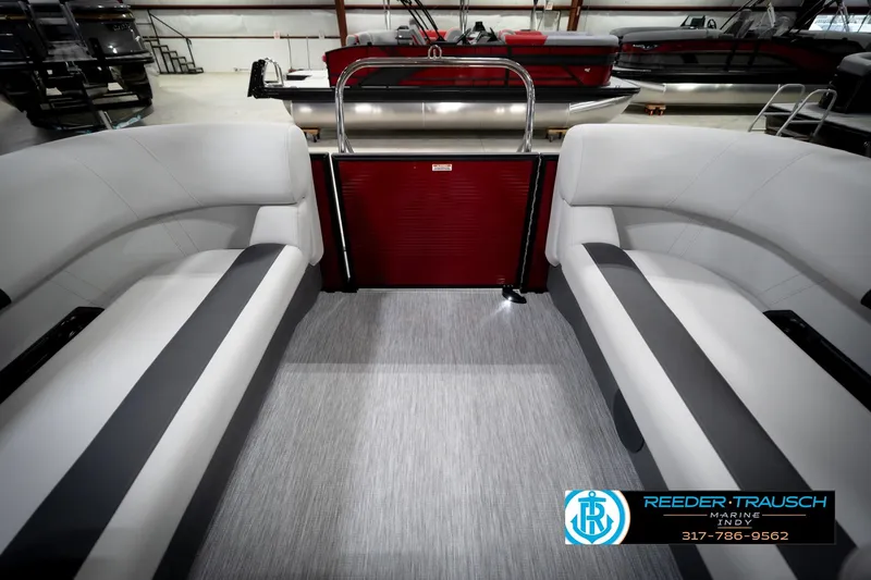 Slide: The Image of 2026 Bennington 20 SSR pontoon boat interior with modern seating and sleek design. - 16
