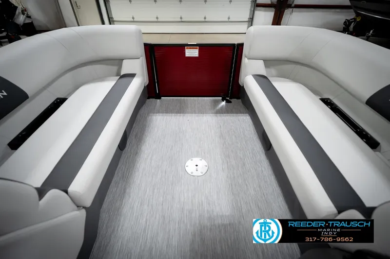 Slide: The Image of Interior of 2026 Bennington 20 SSR pontoon boat with seating and table. - 20